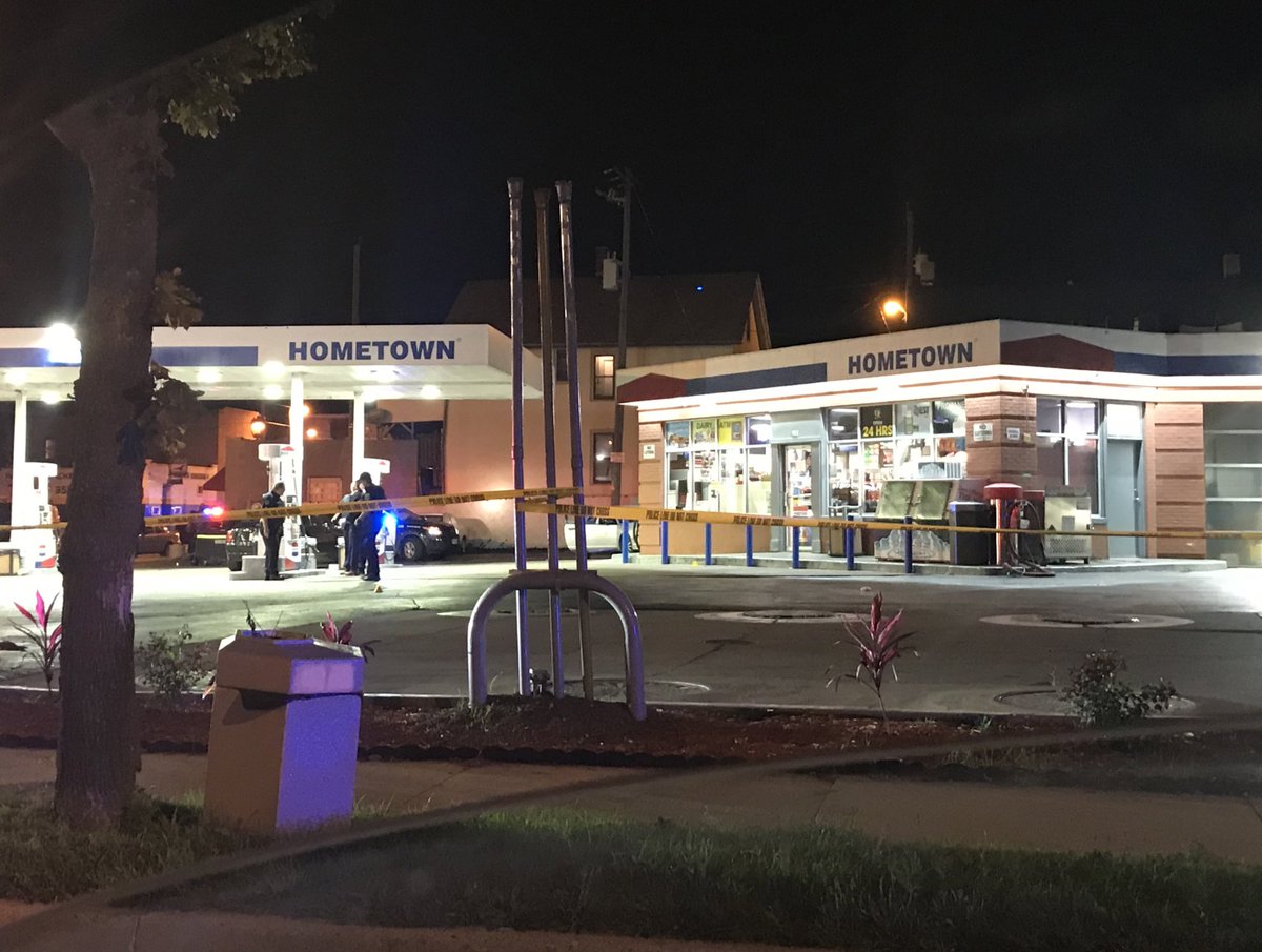 Milwaukee Police and mkemedexamine on scene of a homicide at Hometown