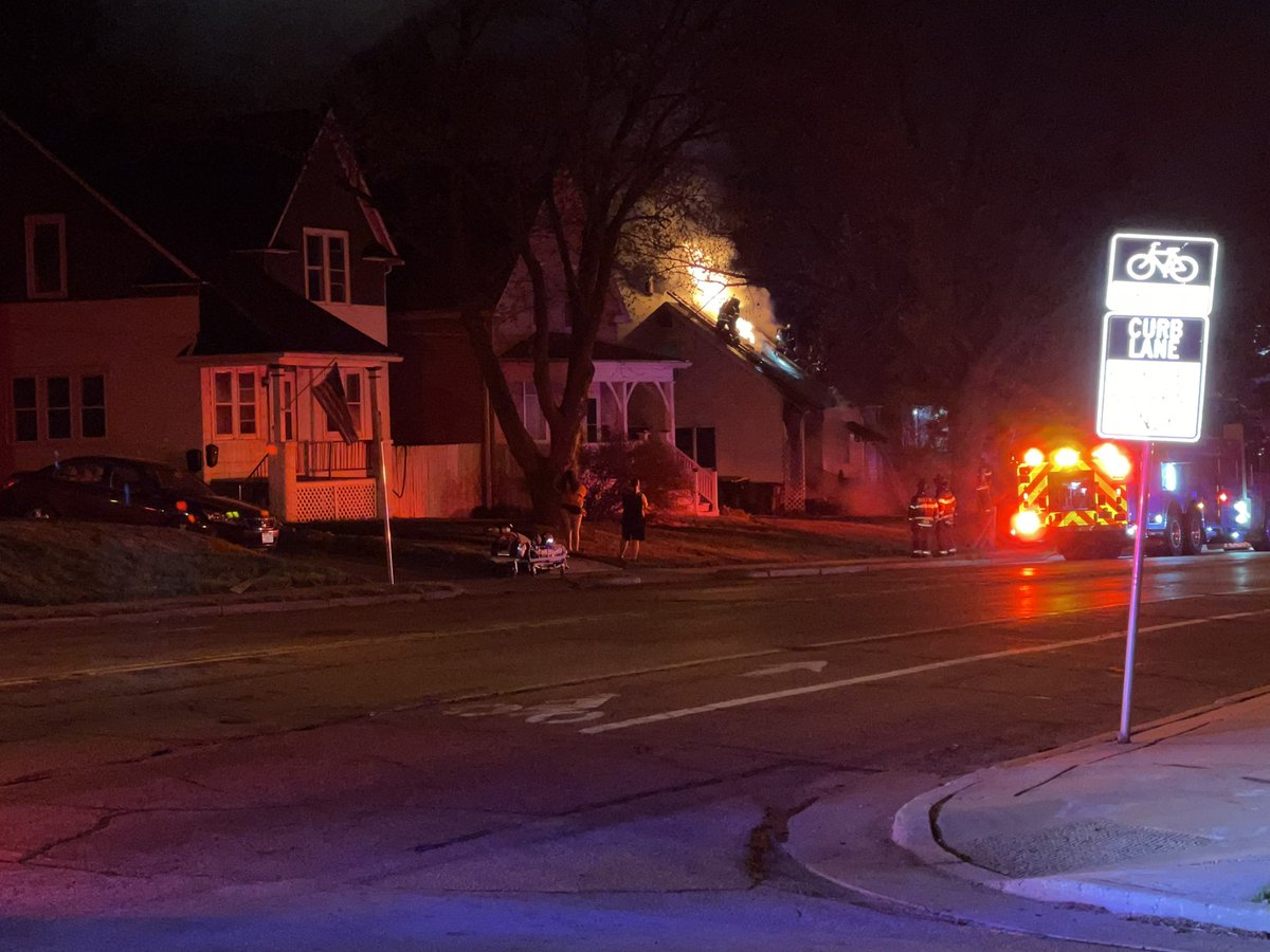 Wauwatosa Fire Department on scene of a working house fire near Wauwatosa Ave and Clarke Street. Heavy fire from the roof.