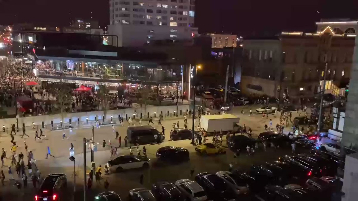 People are being evacuated after reported shoots at Bucks game Wisconsin  Hundreds of terrified Bucks fans running from Deer District game in Milwaukee after reports of multiple shots fired two people have been shot one person has been arrested