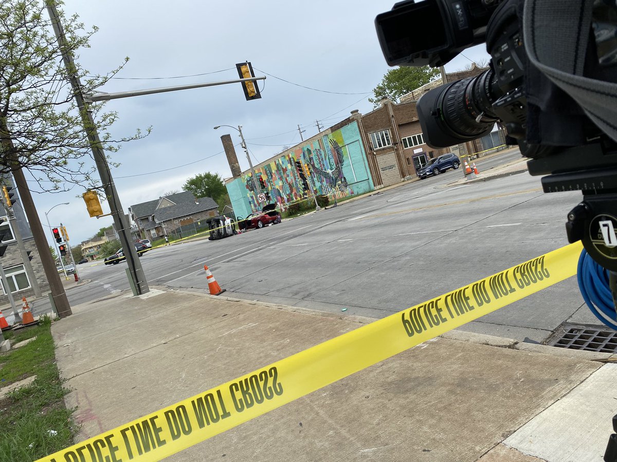 The area of 27th and Center St is blocked off after a car crash. One vehicle on its side.