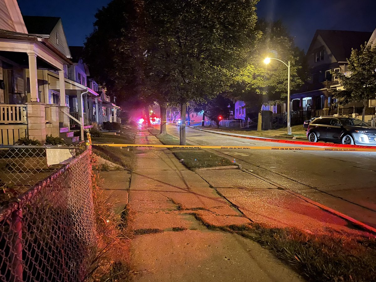 Scene of a fire & reported shooting near 22nd and Center. Flames are visible from this home on 22nd.